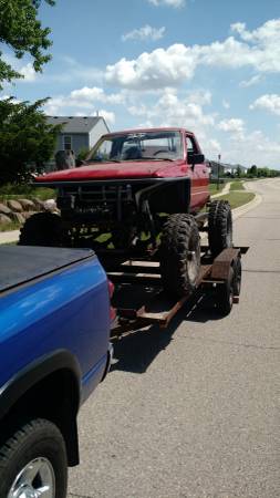 mud trucks on trailer